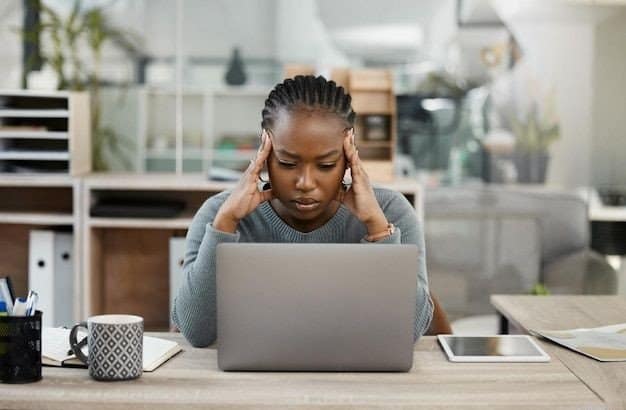 Frustrated business owner looking at sales report, low sales.