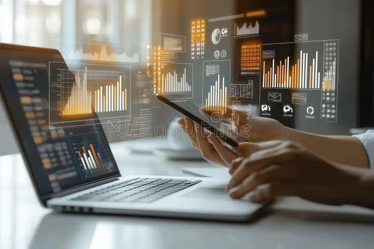 Laptop screen showing social media posts and analytics.